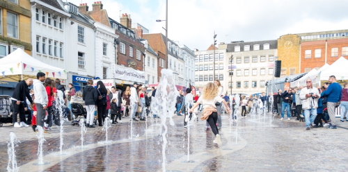 This image: a render of Market Square. 
						The map now highlights green spaces throughout Northampton. Interactive numbered points on the map show the locations of the following schemes currently being delivered 
						throughout the town. Clicking on each map marker brings up the images as listed below.